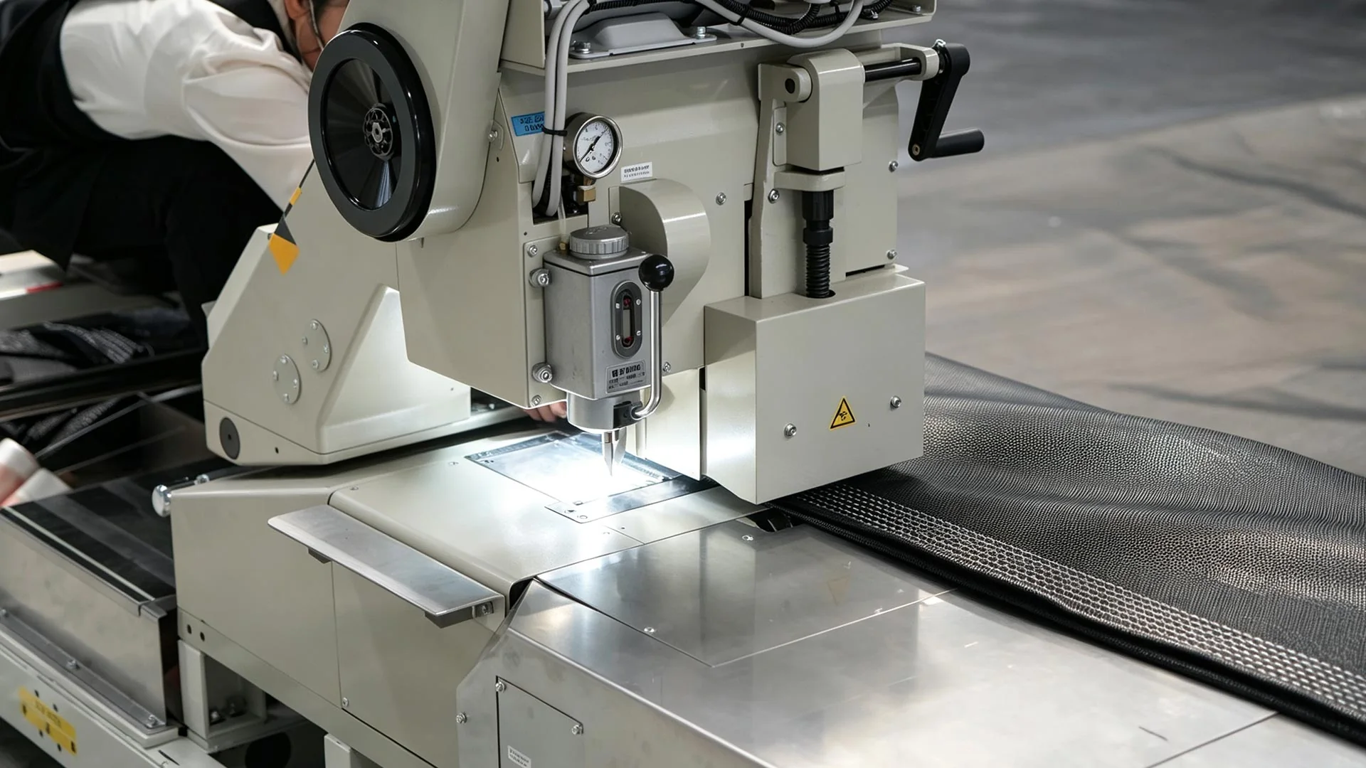 Controlled geosynthetic material processing equipment