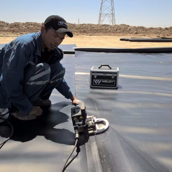 WELDY Miniwelder Geo2 Operating On Geomembrane WELDY Miniwelder Geo2 operating on geomembrane