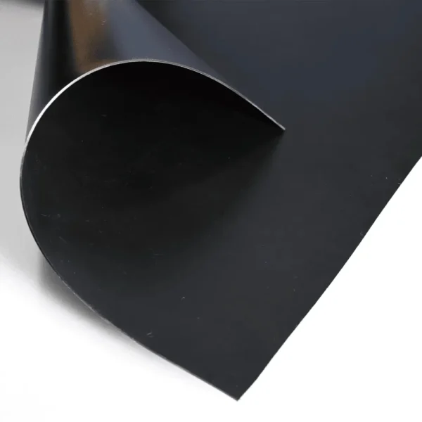 Close-up of a flexible black LLDPE geomembrane liner